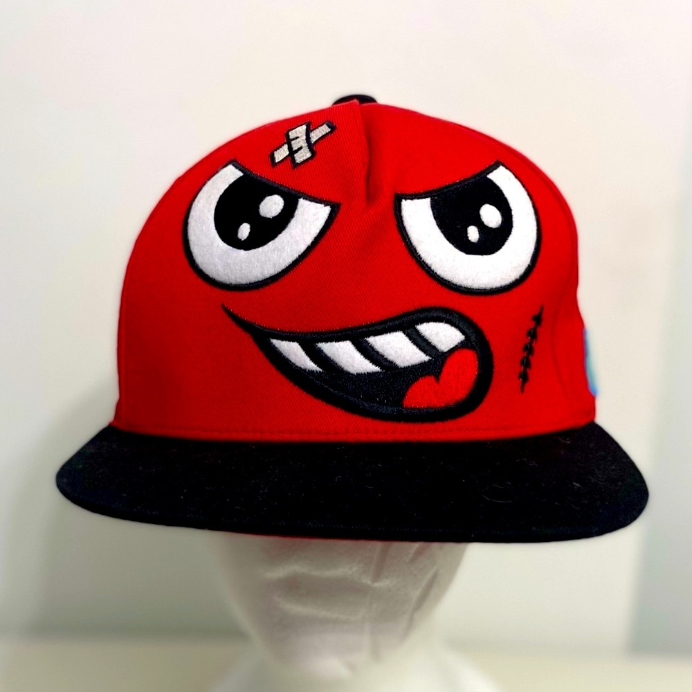 Red cap with face